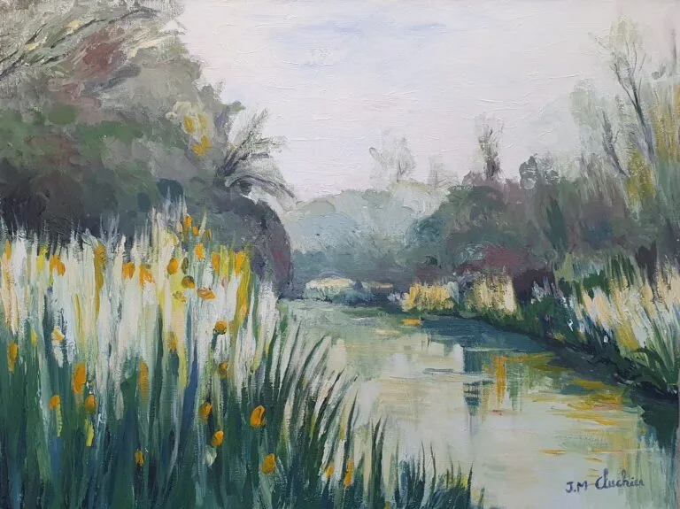 A tranquil river surrounded by rushes
